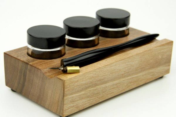 Wooden inkwells holder